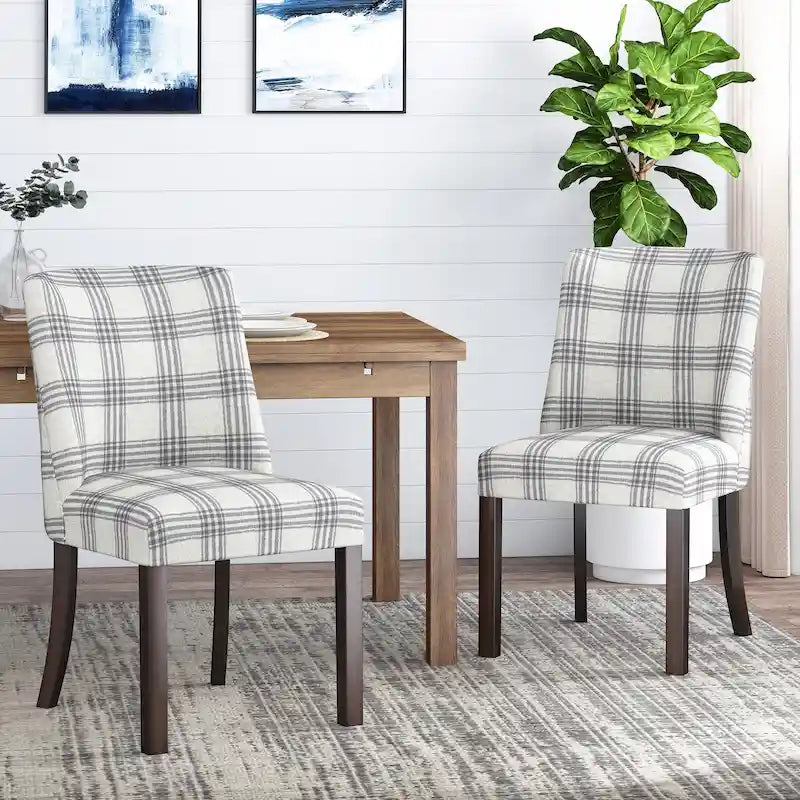 Juego de 2 sillas de comedor tapizadas en tela con detalles de tachuelas y patas de madera de caucho