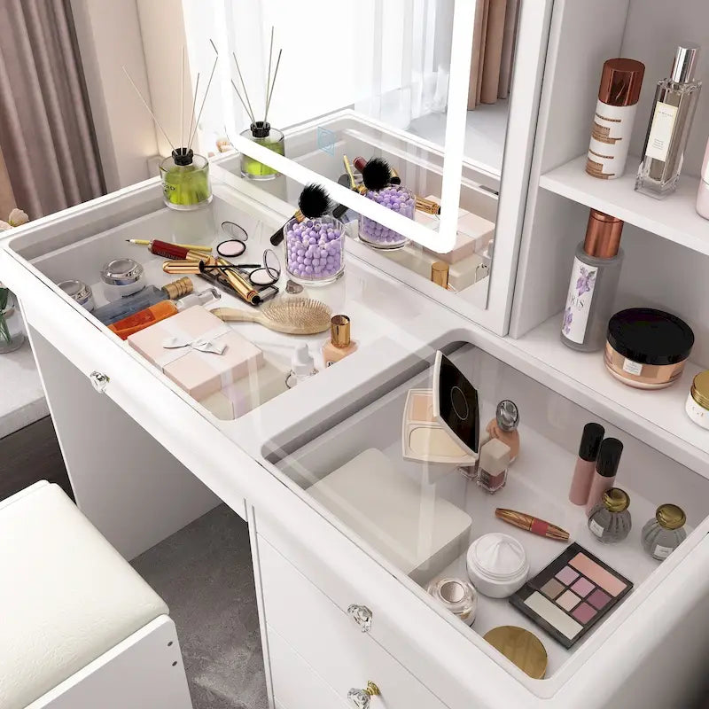 Tocador de maquillaje con espejo corredizo, luces LED, detalles de cristal y cubierta de vidrio