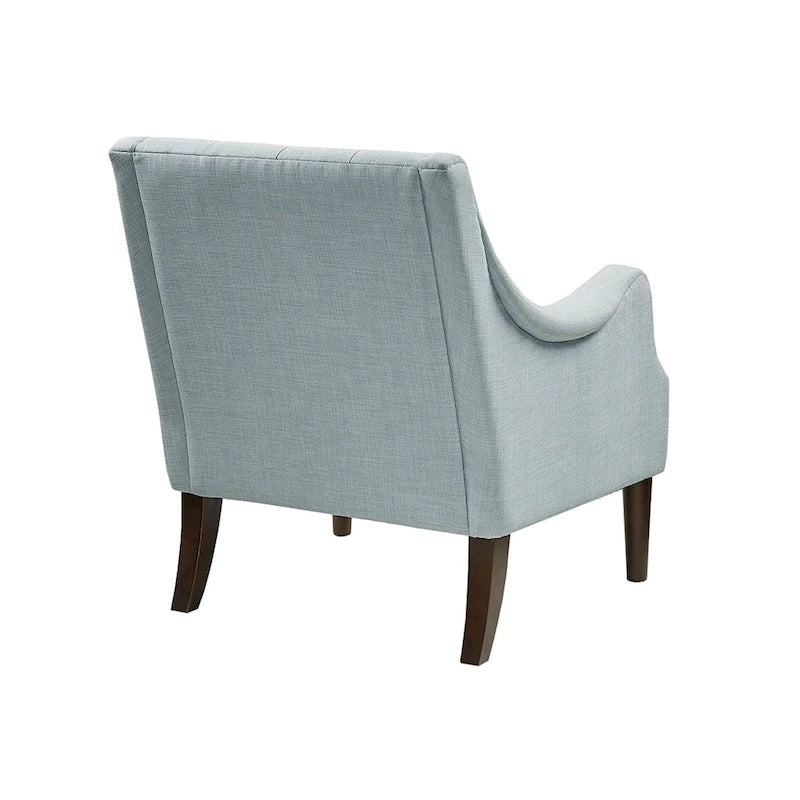 Sillón decorativo moderno con capitoné de botones, brazos redondos y patas de madera