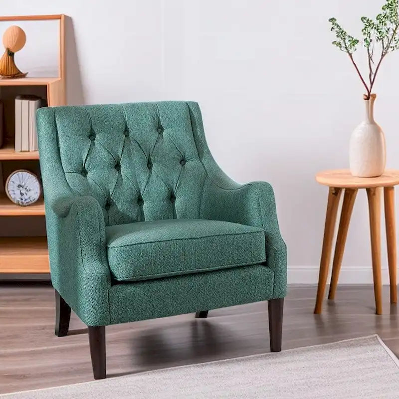Sillón decorativo moderno con capitoné de botones, brazos redondos y patas de madera