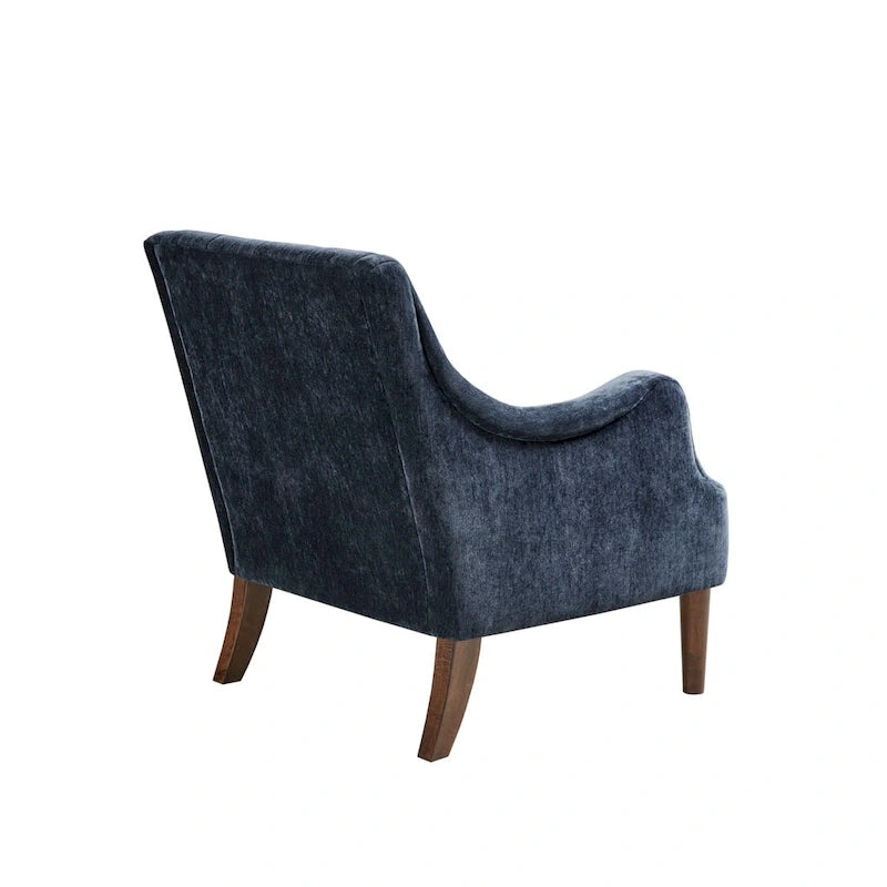 Sillón decorativo moderno con capitoné de botones, brazos redondos y patas de madera